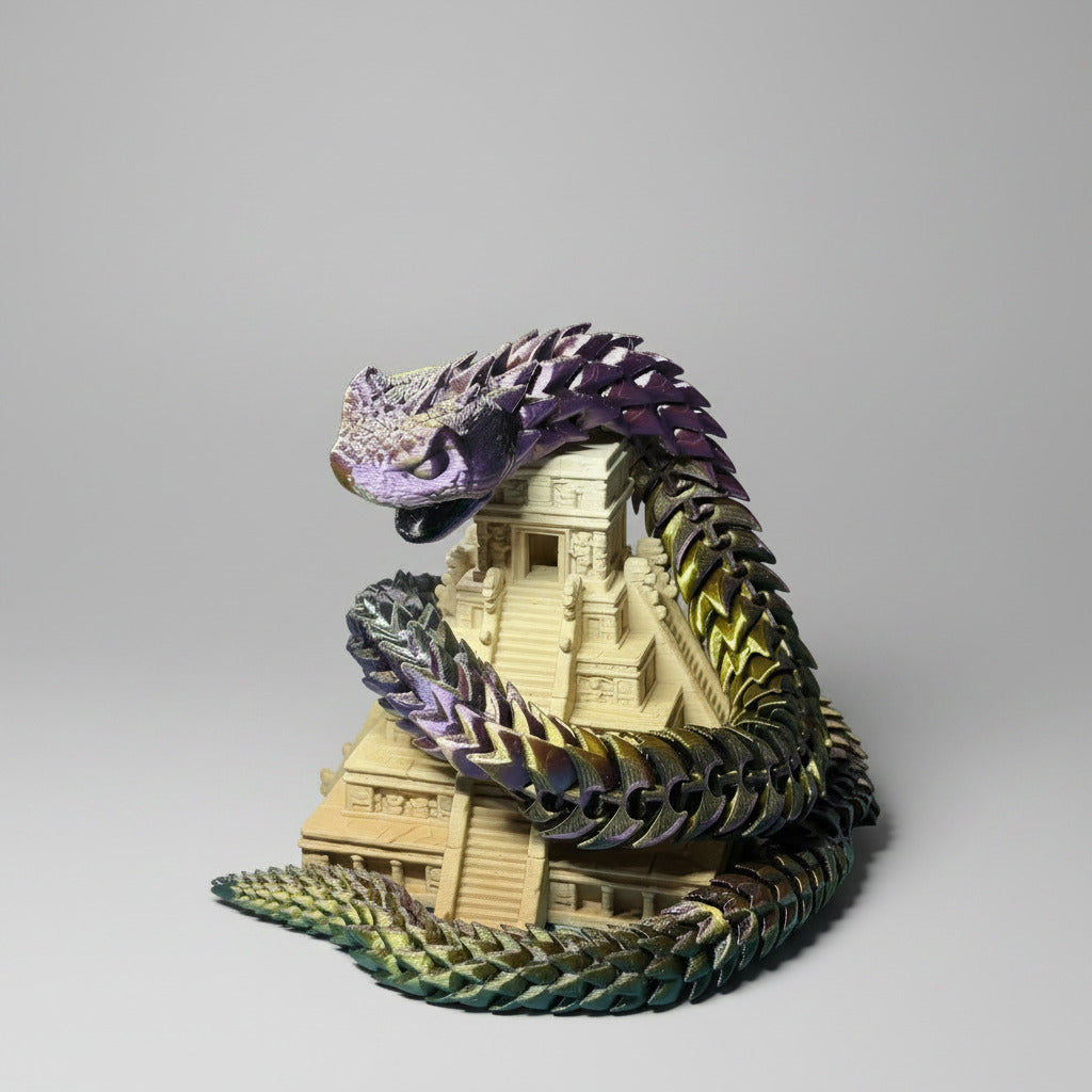 3D printed snake coiled around a pyramid on a 3D printer bed